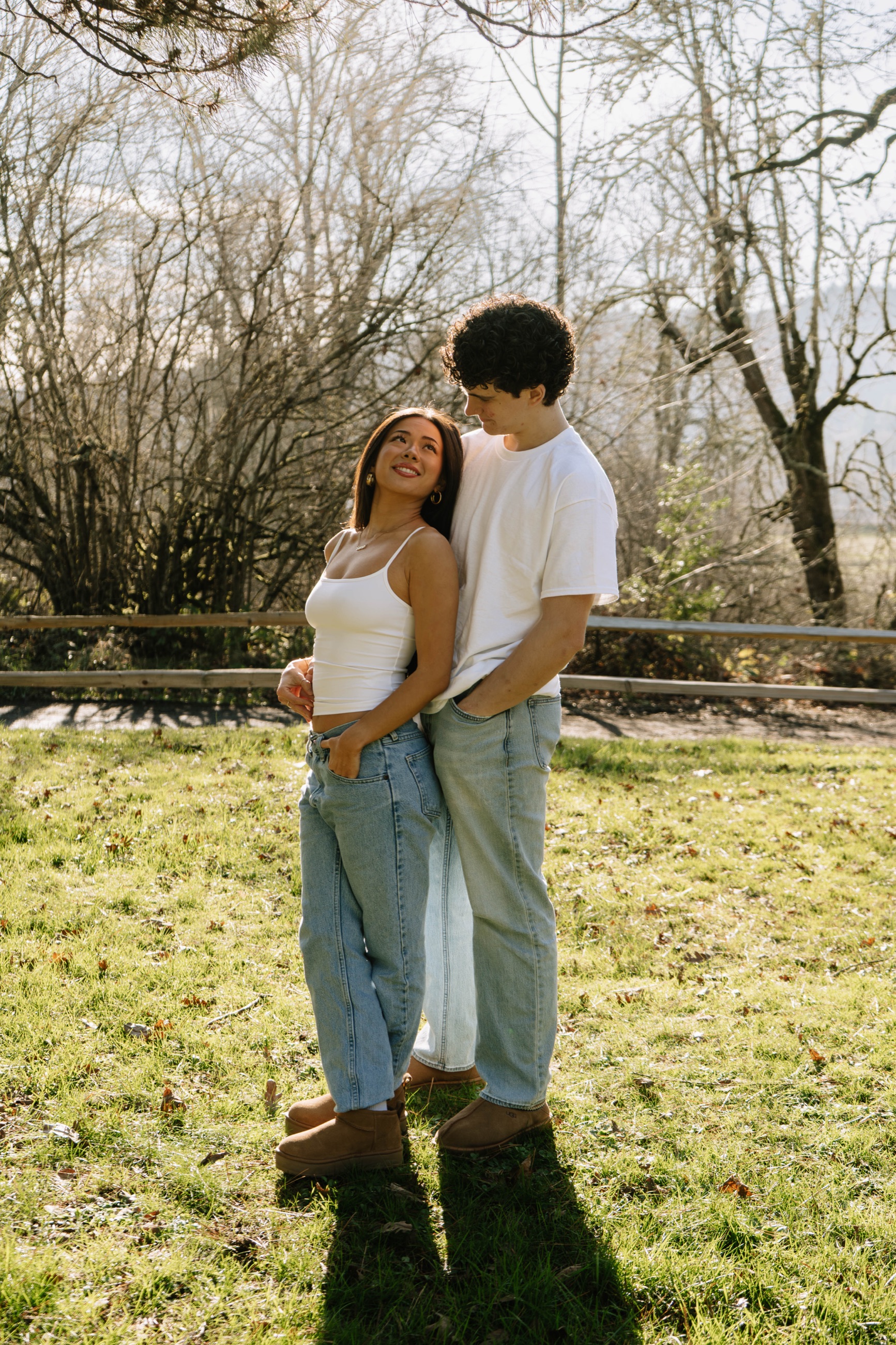 Couple embracing in a sunlit park